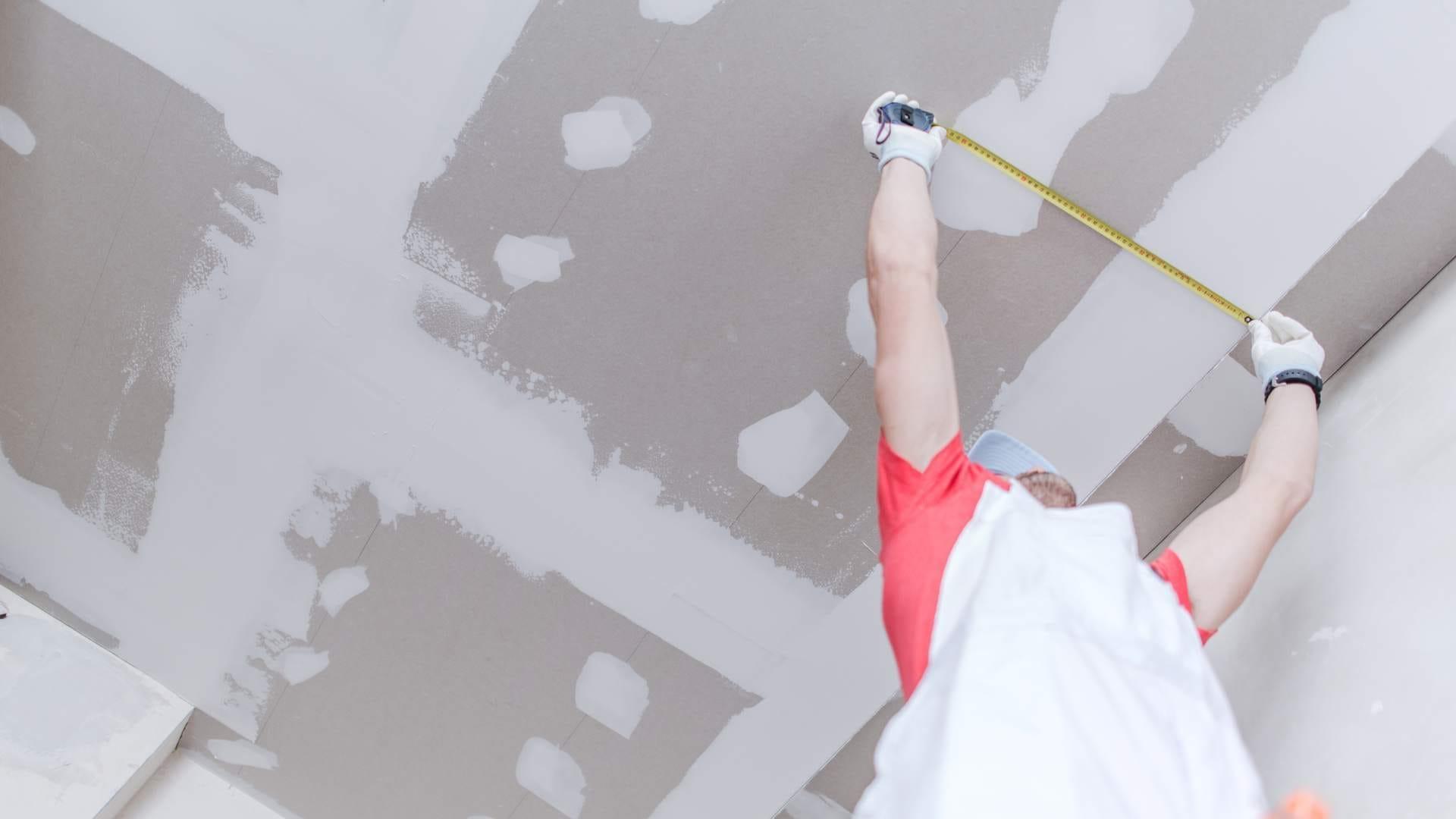Close-up of a drywall patch being applied in a Los Angeles home